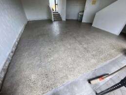 ground concrete in a garage