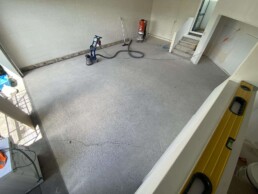 Concrete grinding in a garage