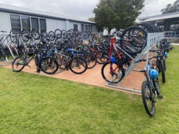 many bikes on a bike rack