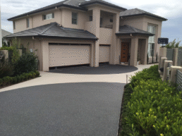 large house with a resin aggregate driveway