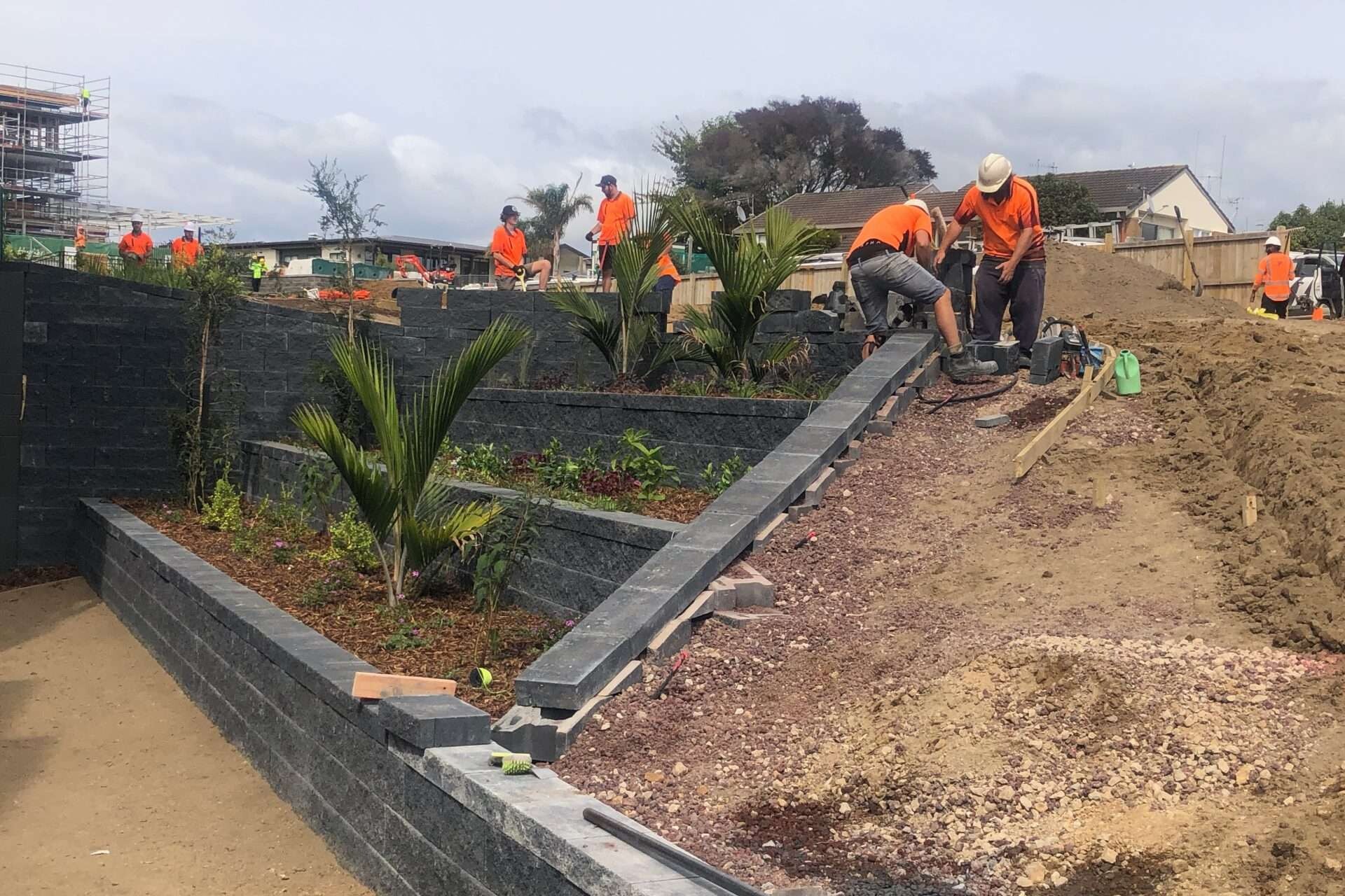 retaining wall being constructed by a1cc