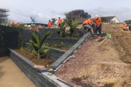 retaining wall being constructed by a1cc