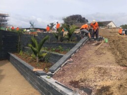 retaining wall being constructed by a1cc