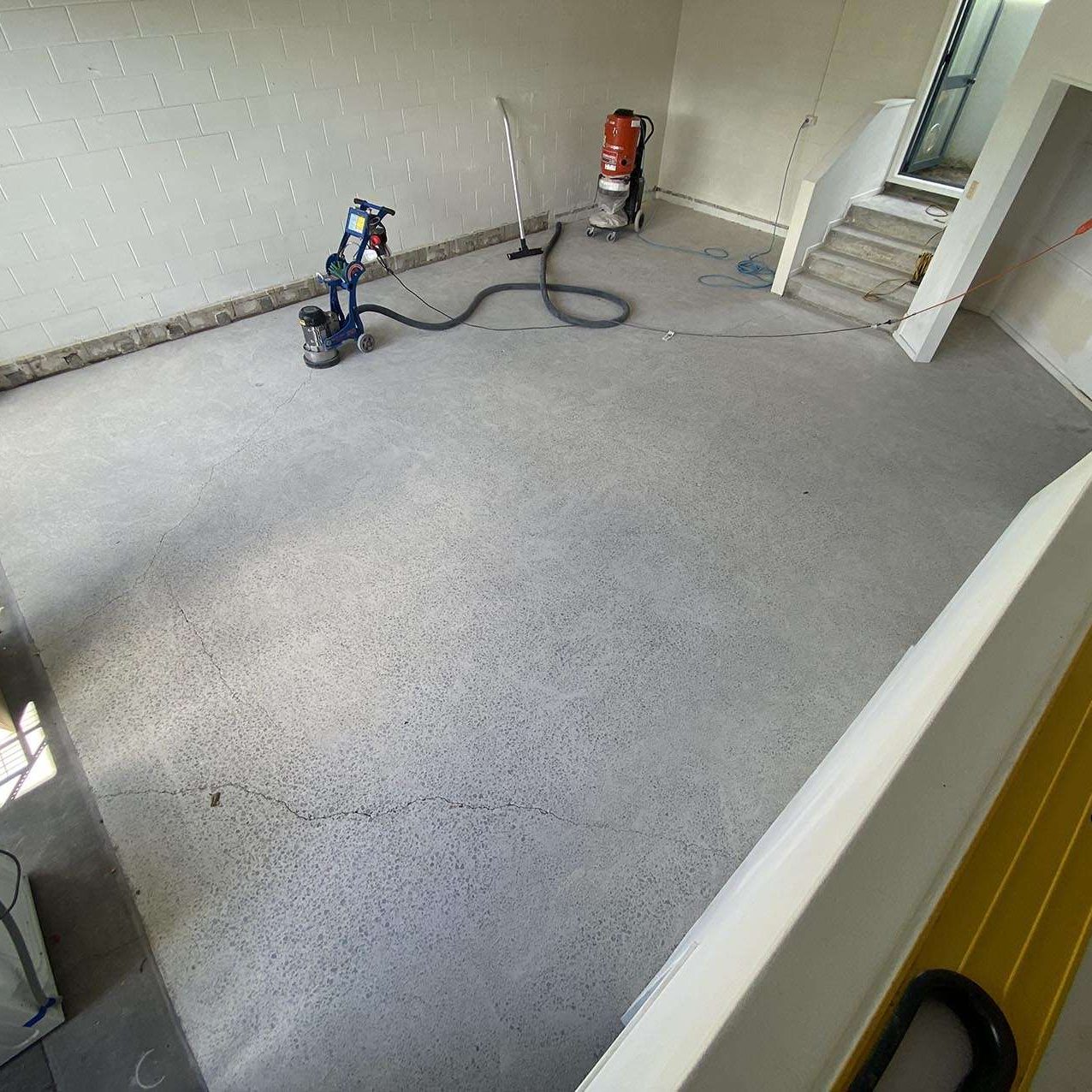 Concrete grinding in a garage